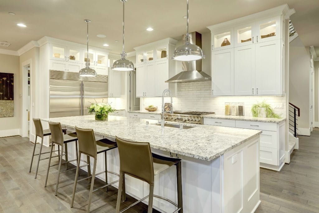 hamptons style kitchen in brisbane with marble island benchtop