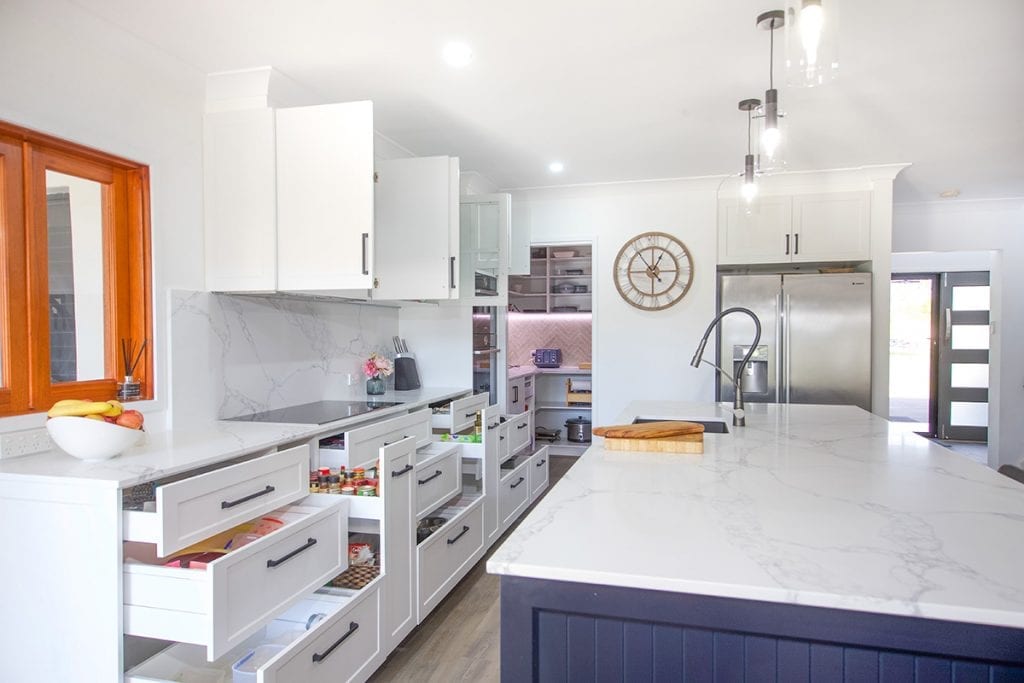 White marble kitchen with natural timber kitchen window