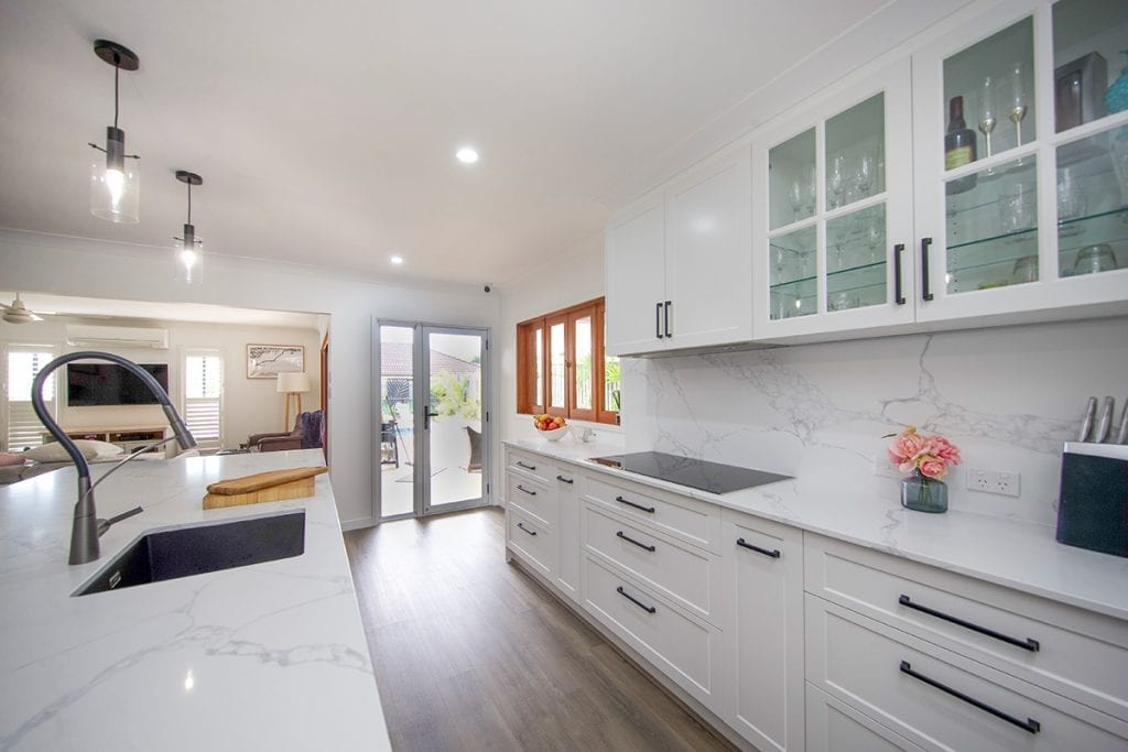 Long marble bench with white marble splashback