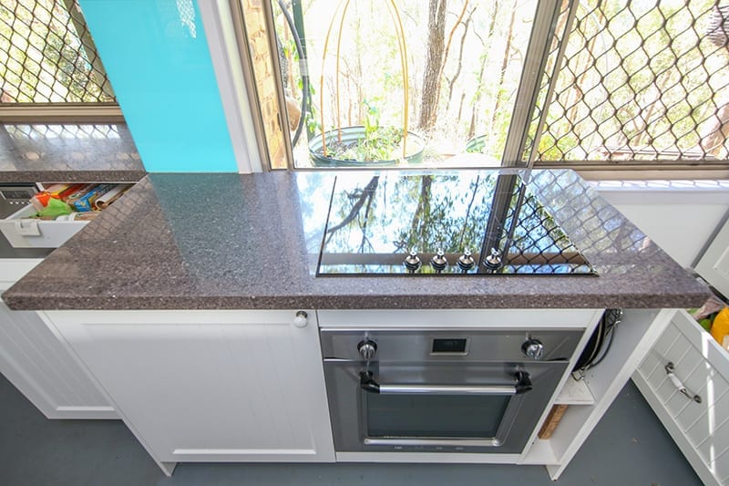 Oven and Kitchen Stove top under kitchen window