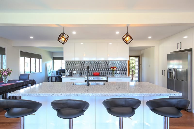 4 bar stools by kitchen island