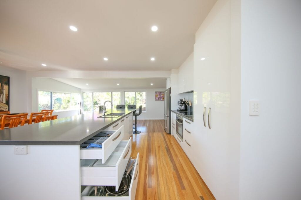 Kitchen Corridor with Open Drawers