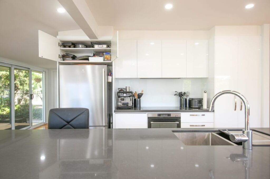 Open Cupboards Above Single Door Stainless Steel Fridge