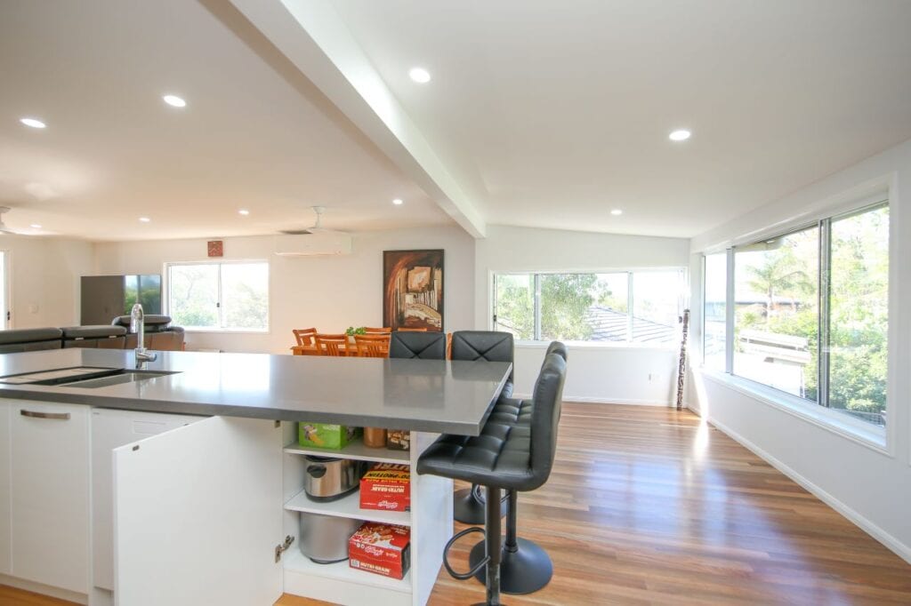 Island Bench with Barstools and Open Storage Cupboard