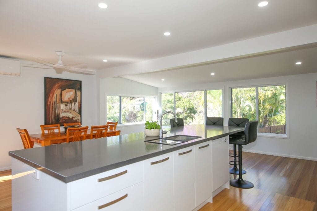 Island Bench with Sink and Dining Table in Background