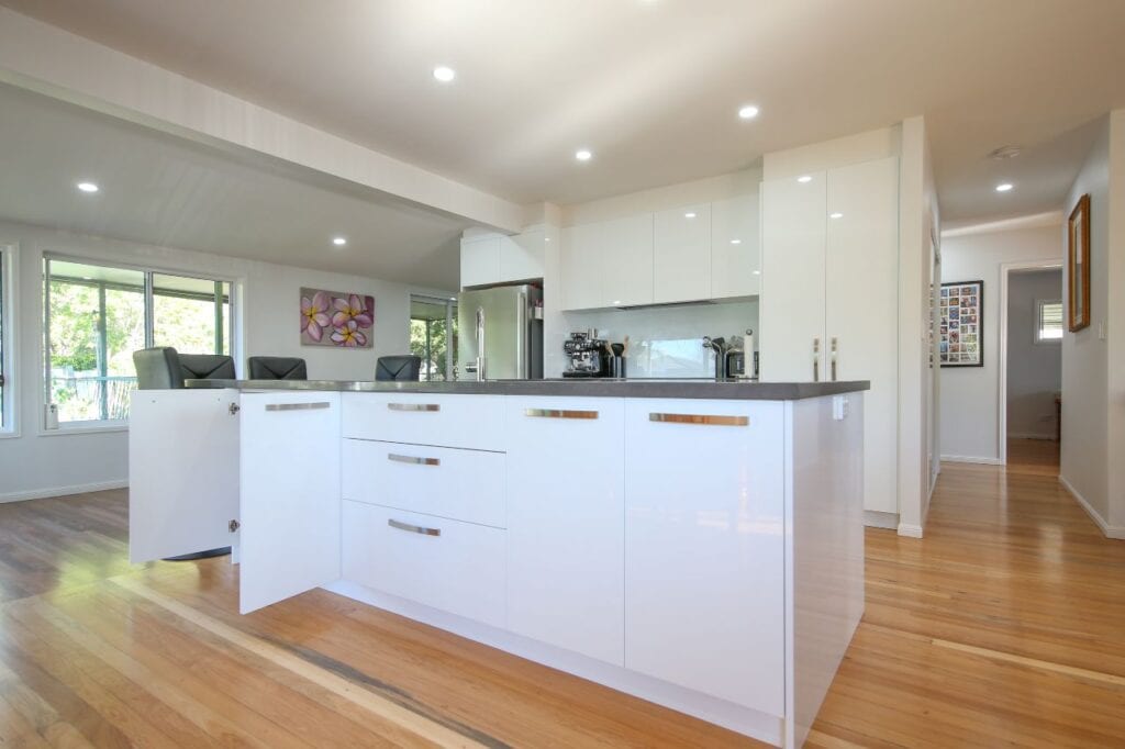 Kitchen Island Bench with cupboard doors and stainless steel handles