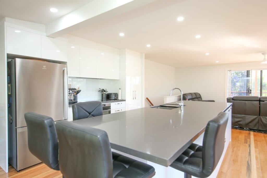 Bar Stools and Single Door Stainless Steel Fridge