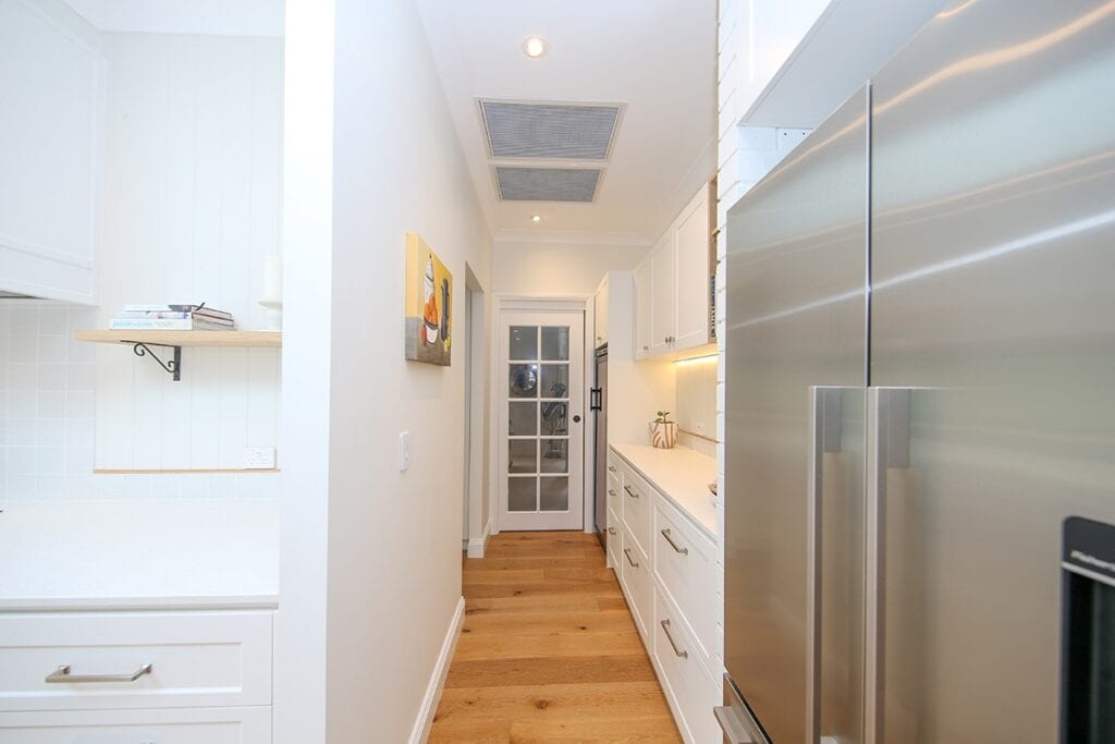 Double Door Stainless Steel Fridge and Kitchen Corridor