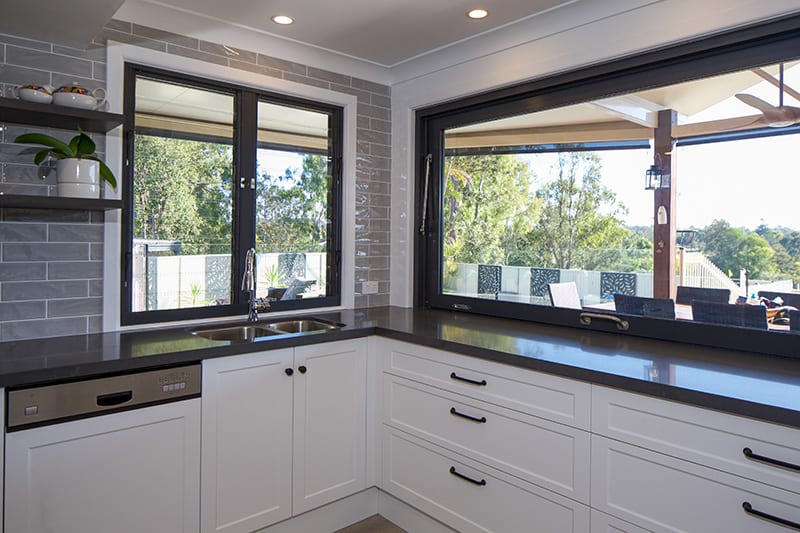 natural light filtering into kitchen from windows