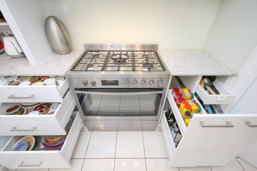 Stainless Steel Kitchen Stove and Open Draws