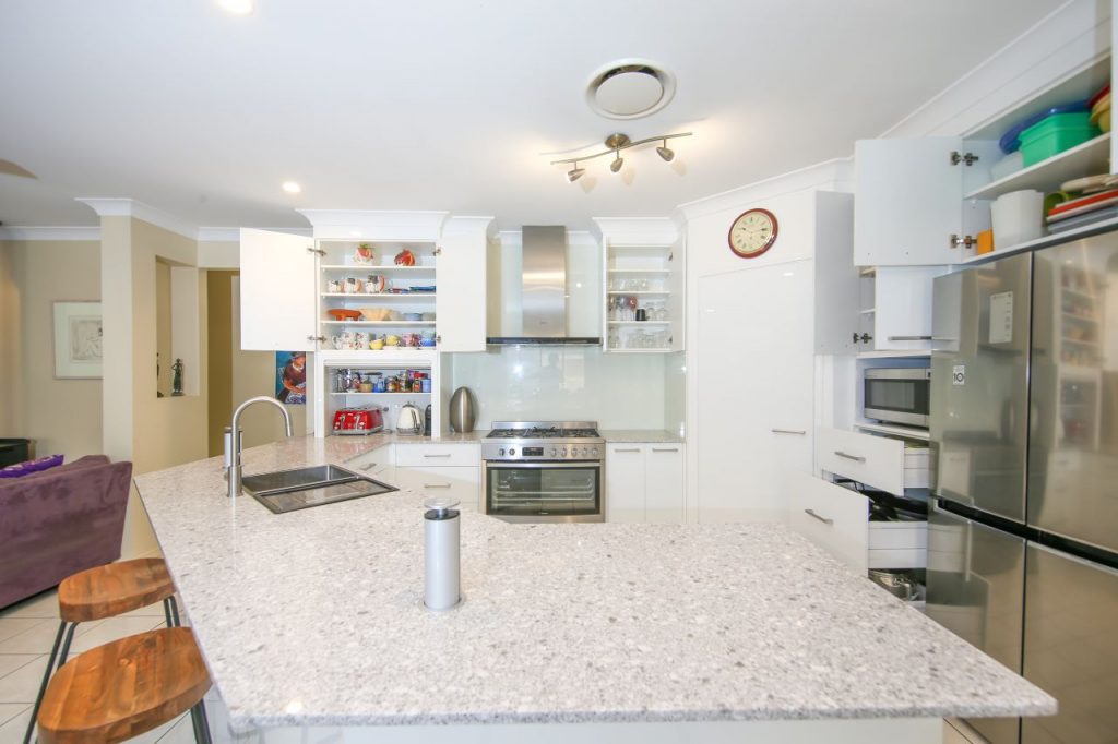 Kitchen Setting With White Marble Bench top