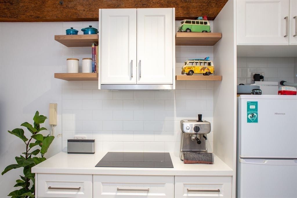 White subway tile style backsplash